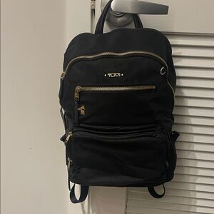 Tumi Black and Gold Men's Backpack
